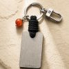 Porte-clé LIENFINITY en Cornaline avec cordon noir