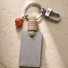 Porte-clé LIENFINITY avec cornaline orange, corde sable et plaque gravée