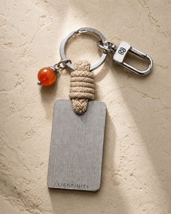 Porte-clé LIENFINITY avec cornaline orange, corde sable et plaque gravée
